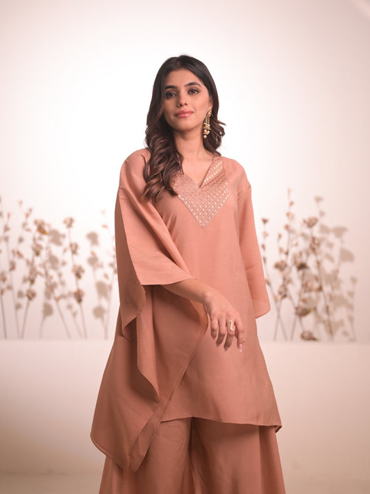 Ayaana Beige Embroidered Kaftan Palazzo Set featuring a stylish kaftan and palazzo pants with machine embroidery.