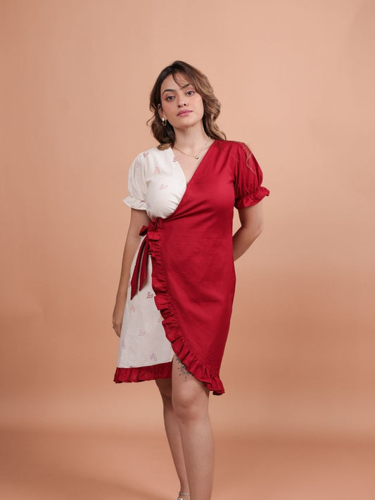 Hearts Red Ruffle Wrap Dress featuring a playful heart print, flattering ruffle design, and adjustable wrap closure.
