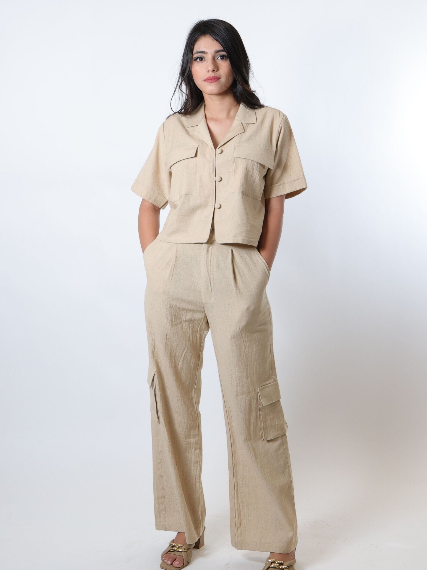 Sand beige shirt and cargo pant co-ord set for women, crafted from cotton blend fabric, featuring a relaxed fit shirt with front pockets and cargo pants with multiple side pockets, perfect for versatile everyday wear with a cool and casual style.
