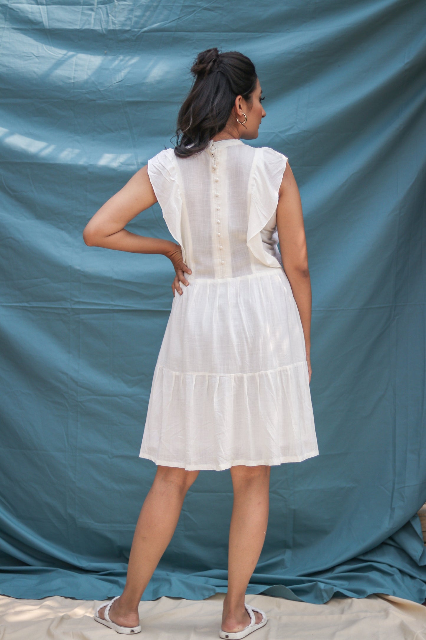 Cream Ruffle Round Dress featuring delicate ruffle details and a flattering round neckline, ideal for summer parties, garden events, or everyday wear. This stylish dress combines comfort and elegance, making it a must-have for your wardrobe.