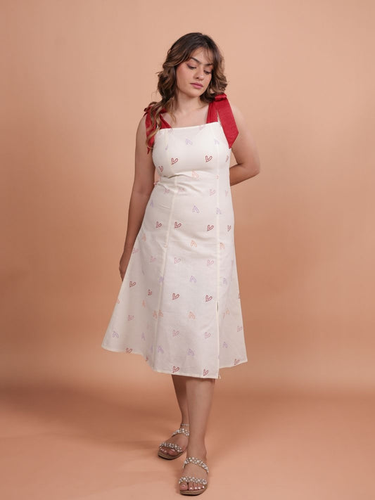 Hearts Red Bow A-line Dress for women featuring a flattering A-line silhouette, vibrant heart print design, and trendy bow detail. Perfect for casual outings, this stylish red dress adds a fun touch to your wardrobe.