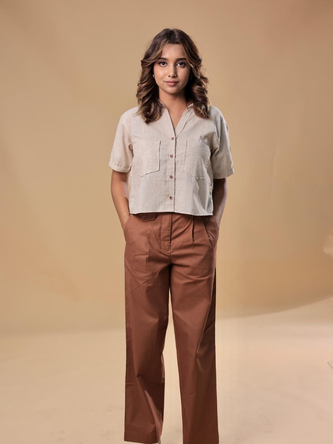 Cotton khadi shirt with unique texture and playful crop cut paired with brown pants made from pure cotton, perfect for brunch, casual gatherings, or running errands, offering a seamless blend of modern style and comfort.