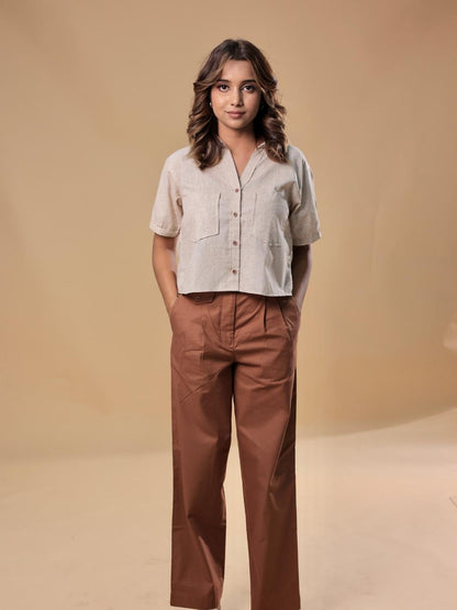 Cotton khadi shirt with unique texture and playful crop cut paired with brown pants made from pure cotton, perfect for brunch, casual gatherings, or running errands, offering a seamless blend of modern style and comfort.