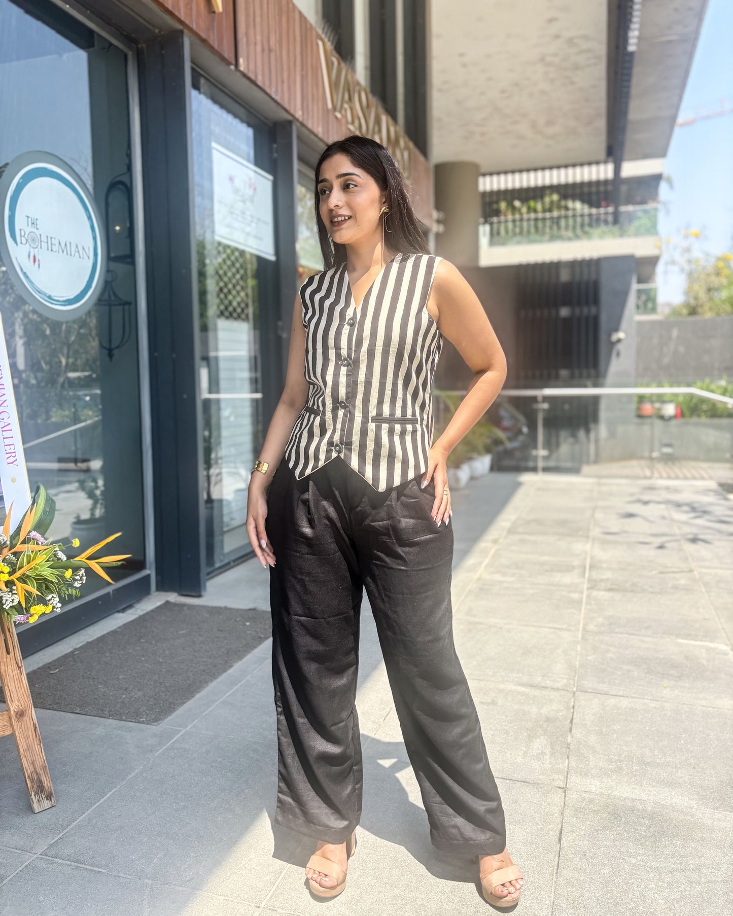 Stay stylish and comfortable this summer with our trendy cotton co-ord set featuring a striped vest and black pants. Perfect for casual work fits and everyday wear.