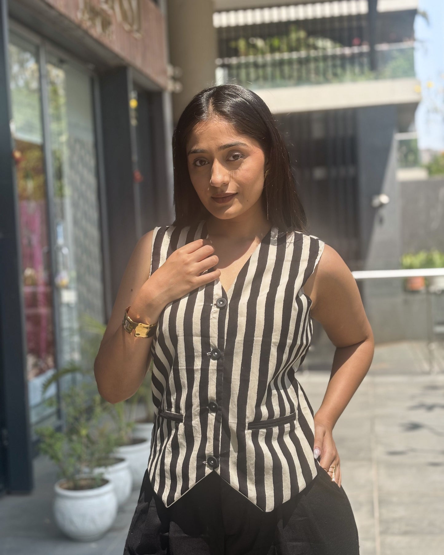 Stay stylish and comfortable this summer with our trendy cotton co-ord set featuring a striped vest and black pants. Perfect for casual work fits and everyday wear.