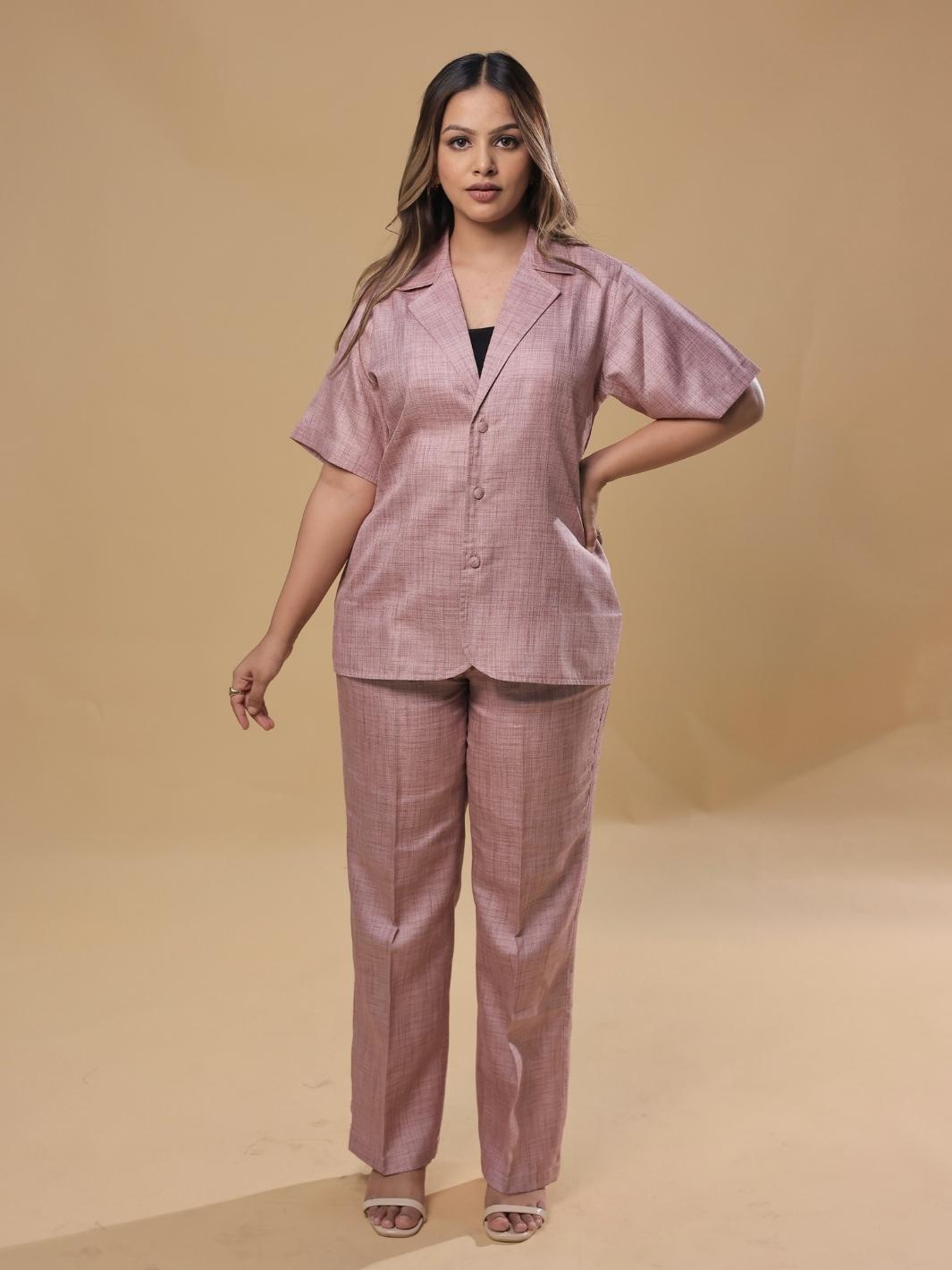 City Girl Pink Coat Pant Co-Ord Set featuring a stylish pink coat and matching pants, perfect for urban outings and sophisticated casual looks. This fashionable two-piece set is designed for women who embrace modern style.