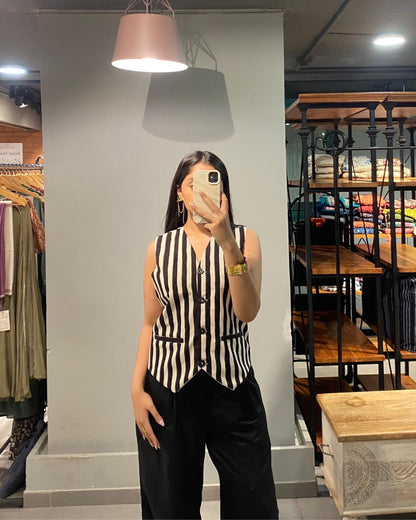 Stay stylish and comfortable this summer with our trendy cotton co-ord set featuring a striped vest and black pants. Perfect for casual work fits and everyday wear.