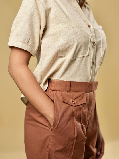 Cotton khadi shirt with unique texture and playful crop cut paired with brown pants made from pure cotton, perfect for brunch, casual gatherings, or running errands, offering a seamless blend of modern style and comfort.
