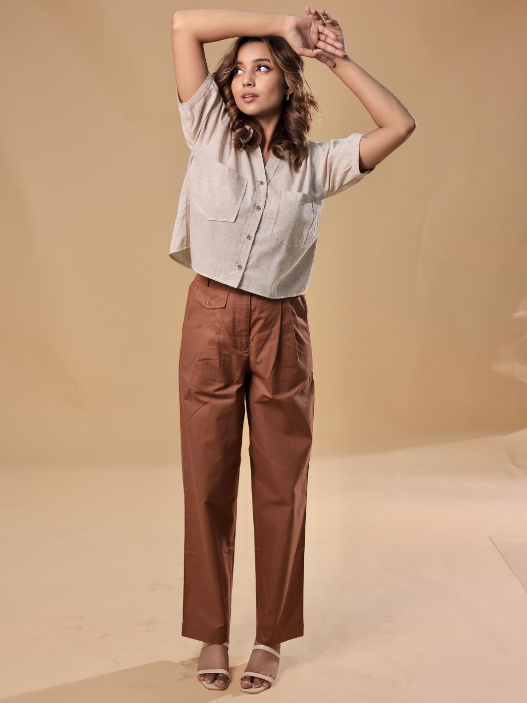 Cotton khadi shirt with unique texture and playful crop cut paired with brown pants made from pure cotton, perfect for brunch, casual gatherings, or running errands, offering a seamless blend of modern style and comfort.