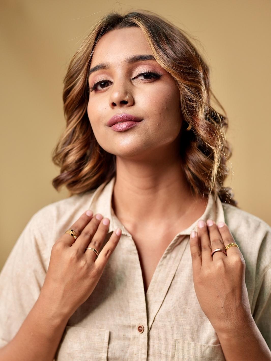 Cotton khadi shirt with unique texture and playful crop cut paired with brown pants made from pure cotton, perfect for brunch, casual gatherings, or running errands, offering a seamless blend of modern style and comfort.