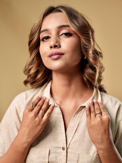 Cotton khadi shirt with unique texture and playful crop cut paired with brown pants made from pure cotton, perfect for brunch, casual gatherings, or running errands, offering a seamless blend of modern style and comfort.